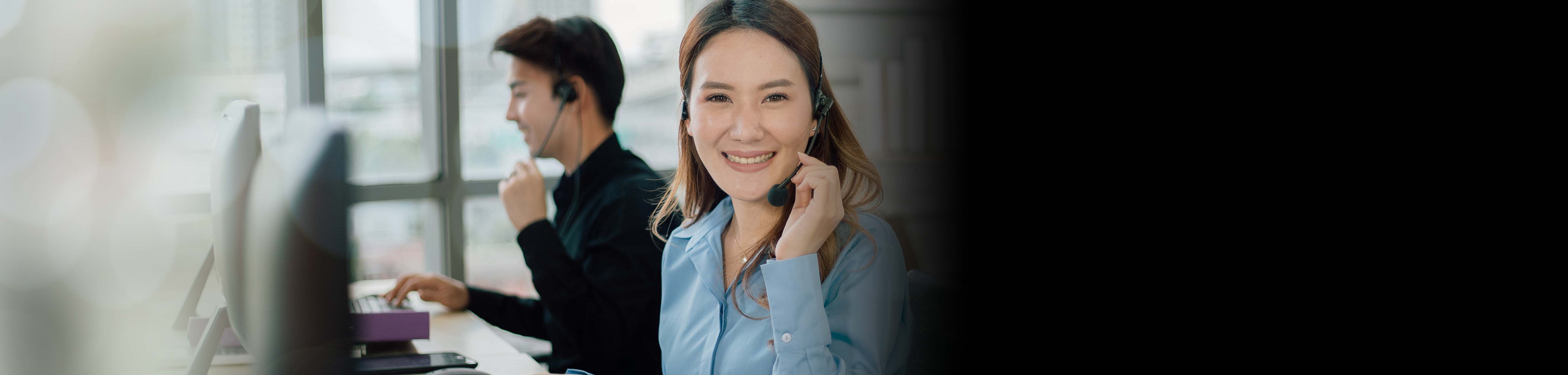 A customer service lady talking on a phone